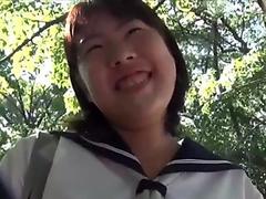 Japanese teen in uniform riding