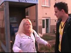 Blonde granny pleases a stranger